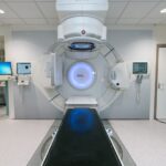 A sterile medical room featuring advanced oncology treatment equipment designed for minimally invasive procedures.