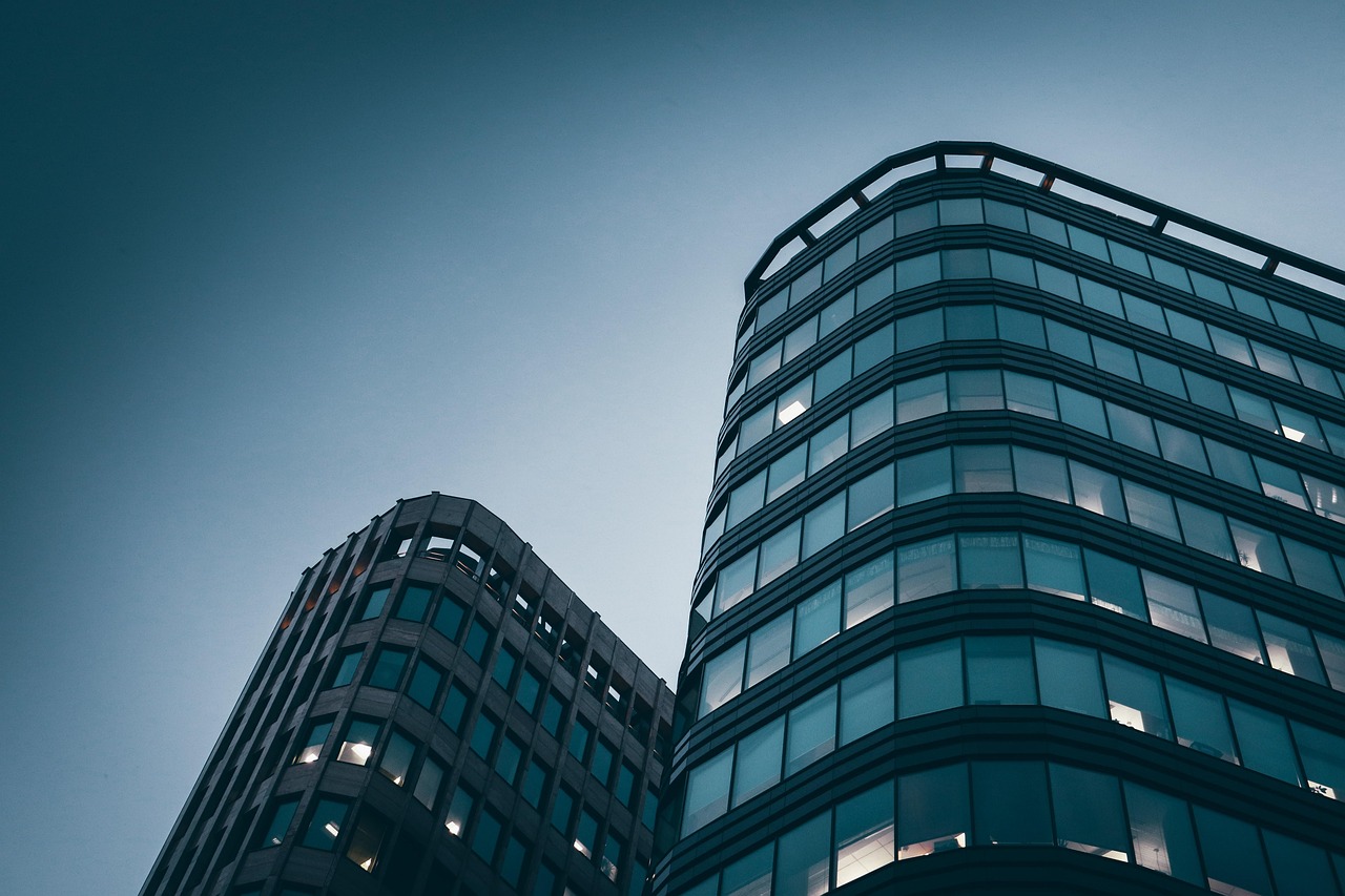 Building, city, business — Allan Boomer New York: Pioneering Financial Leadership Through Inclusion and Innovation